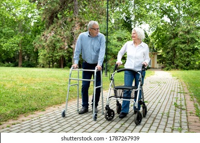 Elder man and a elder woman strolling using walkers