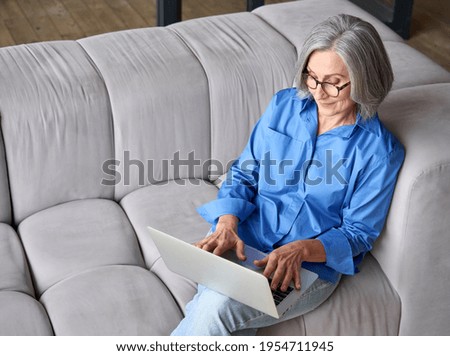 Similar – Image, Stock Photo Senior woman working in  carpentry