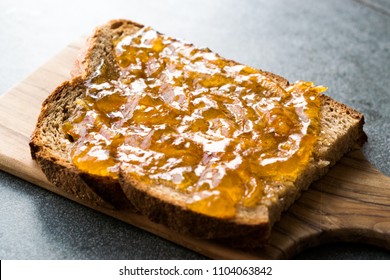 Elderflower Marmalade With Orange Peel On Bread / Jam.