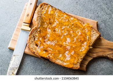 Elderflower Marmalade With Orange Peel On Bread / Jam.