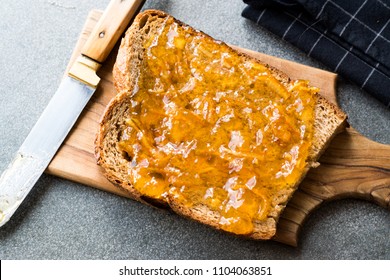 Elderflower Marmalade With Orange Peel On Bread / Jam.