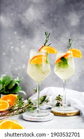 Elderflower Prosecco Cocktail: A Bubbly, Fruity, Lightly Sweetened Cocktail Made With Prosecco, Elderflower Syrup, Fresh Mint And Rosemary, Club Soda, And Orange Slices.