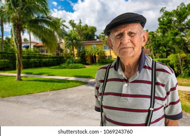 Elderly 80 Plus Year Old Man Outdoor Portrait Standing In Front Of A Home.