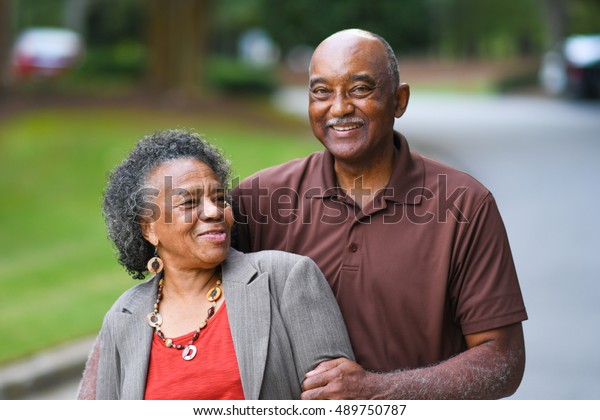 Elderly\
African American Man and woman posing together\
