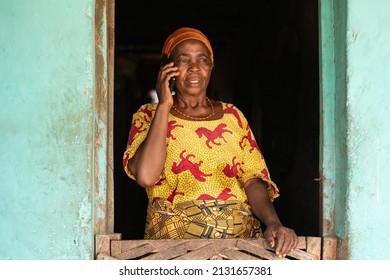 elderly african woman making a phone call