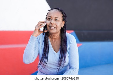 Elderly African Woman Talking On A Call Using Mobile Phone