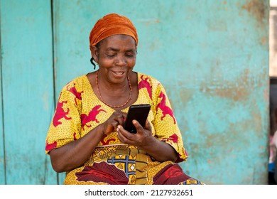 Elderly African Woman Using Her Smartphone