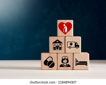 Elderly Care Concept. Wooden Cubes With Elderly Care Icons Of Medical And Nursing Care, Rehabilitation Service For Enhancing Quality Of Life In Elder Age