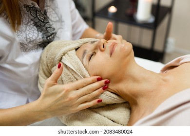 Elderly Caucasian Female On Facial Massage 