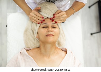 Elderly Caucasian Female On Facial Massage	