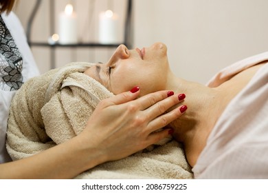 Elderly Caucasian Female On Facial Massage	