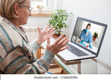 Elderly caucasian woman interacting with young female doctor via chat video call,medical worker seeing patient in virtual house call,telemedicine during pandemic and on demand medical service concept 