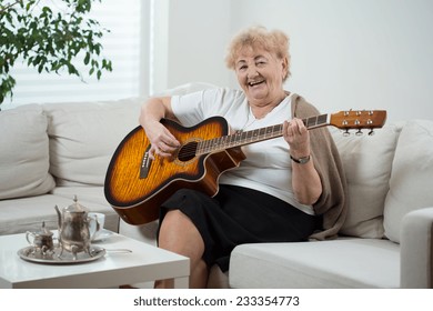Elderly cheerful woman singing the song