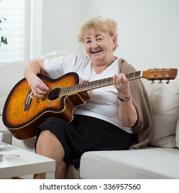 Elderly Cheerful Woman Singing The Song