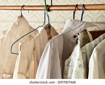 Elderly Clothes On Wire Hangers