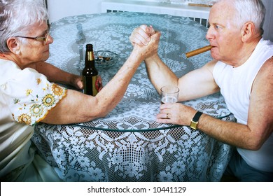 Elderly Couple Arm Wrestling