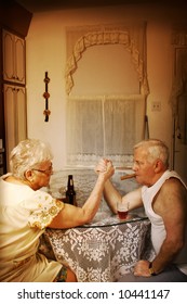 Elderly Couple Arm Wrestling