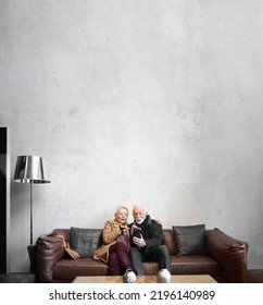 Elderly Couple Blowing Kisses To Their Friends And Family With The Smartphone