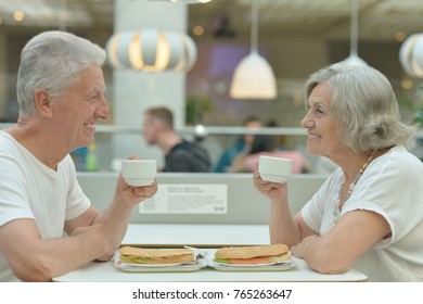 Elderly Couple  In Cafe