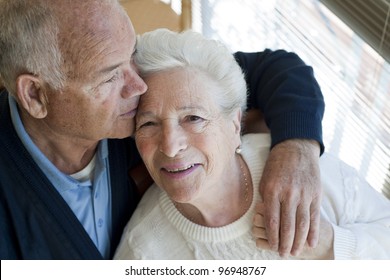 Elderly Couple Embracing
