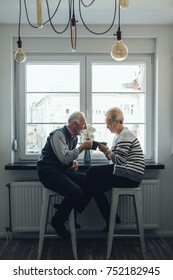 Elderly Couple Having Coffee