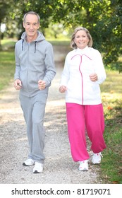 Elderly Couple Jogging