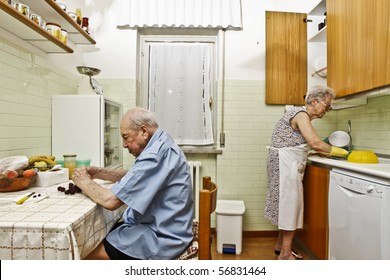 elderly couple in the kitchen - Powered by Shutterstock