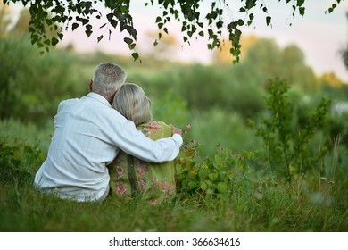 Elderly  couple on nature  at summer