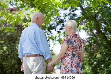 Elderly Couple Outside In Park