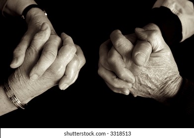 Elderly Couple Praying