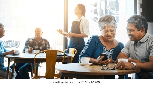 Elderly couple, restaurant and table together for bonding, smartphone and talking or browsing and online search. Internet, relationship and coffee shop for relax lunch, date and reading blog - Powered by Shutterstock