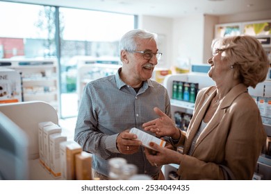 Elderly couple shopping for medication at a pharmacy - Powered by Shutterstock