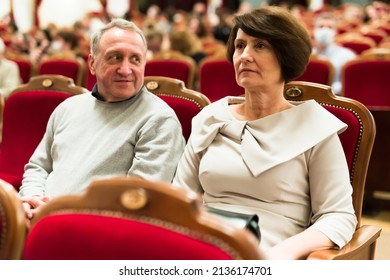 Elderly Couple Watching Play In The Theater