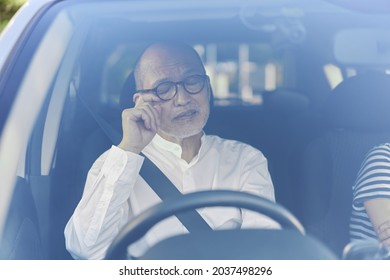 Elderly driver getting sleepy while driving
