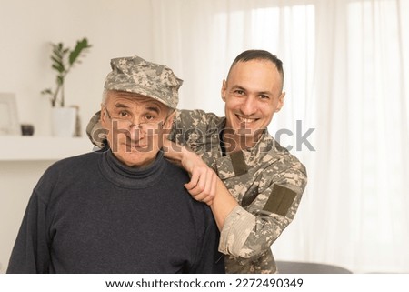 an elderly father and a military son