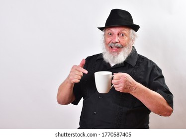 Elderly Gentleman Enjoying His Caffeine Jolt
Hipster Enjoying His Mug Of Coffee
Well Dressed Man Getting His Caffeine High