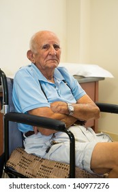 Elderly Handicapped 80 Plus Year Old Man In A Doctor Office Setting.