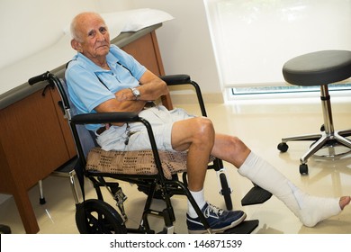 Elderly Handicapped Eighty Plus Year Old Man In A Doctor Office Setting.