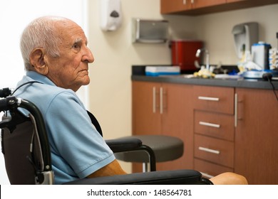 Elderly Handicapped Eighty Plus Year Old Man In A Doctor Office Setting.