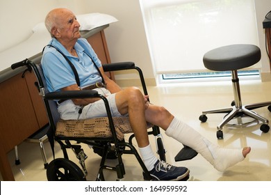 Elderly Handicapped Eighty Plus Year Old Man In A Doctor Office Setting.