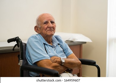 Elderly Handicapped Eighty Plus Year Old Man In A Doctor Office Setting.