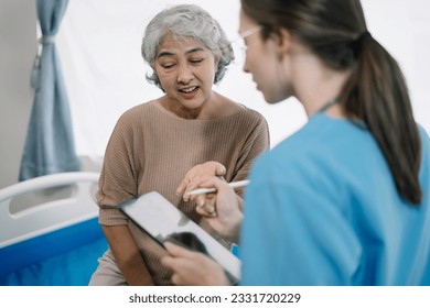 Elderly health checkups with a physician or psychiatrist who works with patients who are consulted about female or psychiatric diagnosis in a medical clinic or hospital mental health service. - Shutterstock ID 2331720229