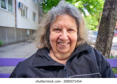Elderly Jewish Lady Smiling Portrait Outdoors in Spring