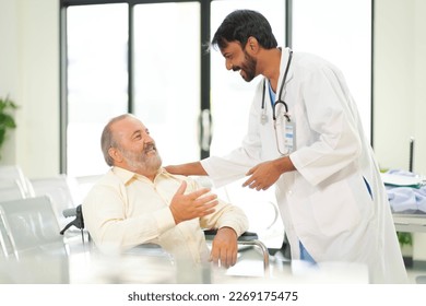 An elderly male patient with high body fat, obesity, sees a doctor at the hospital due to body problems because of a lot of weight. - Powered by Shutterstock