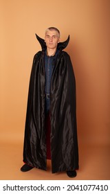 An Elderly Man In A Cloak Count Dracula Black On Halloween Depicts A Bloody Vampire