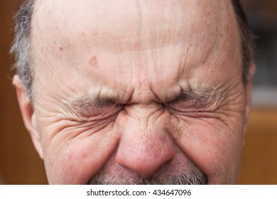 Elderly Man Closed His Eyes With Fear. Negative Emotions.