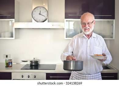 Elderly Man Cooking Pasta