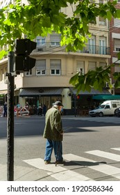 Elderly Man Crossing The Street At The Crosswalk In The Recoleta Neighborhood, Buenos Aires, Argentina On December 10, 2018.