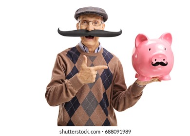 Elderly Man With Fake Moustache Pointing At A Piggybank With Fake Moustache Isolated On White Background