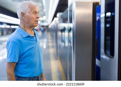 Elderly Man Getting On Modern Subway Car